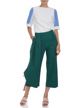 Cropped trousers with leather tassels 